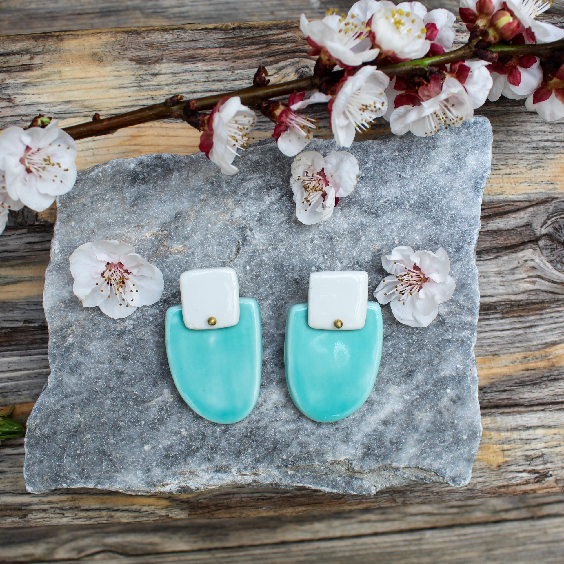 Stud statement porcelain earrings in white and aquamarine color
