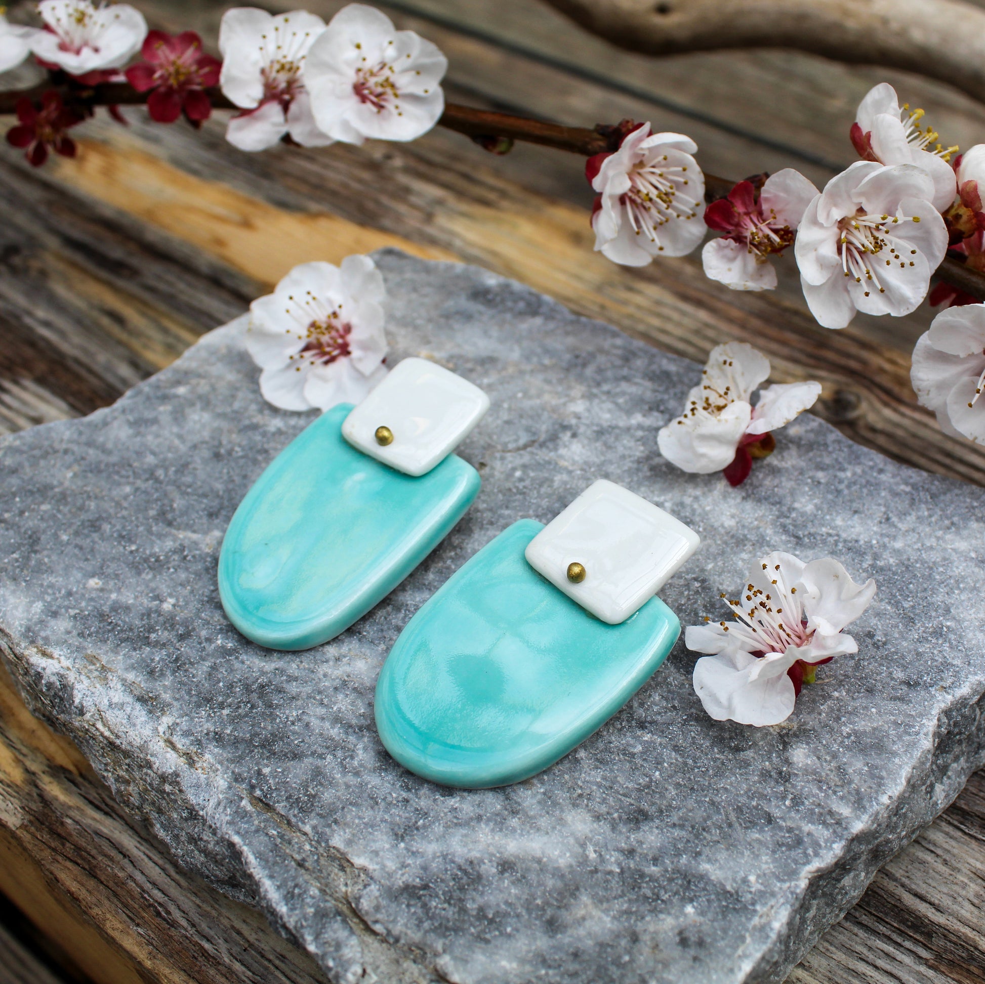 Stud statement porcelain earrings in white and aquamarine color