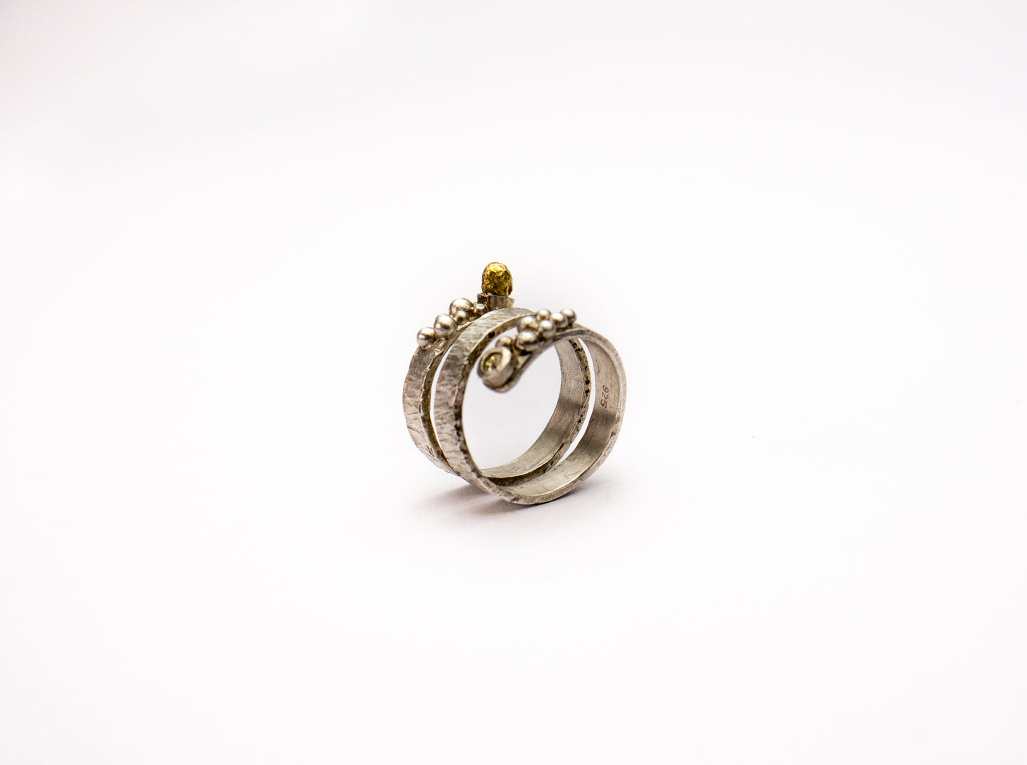 Statement sterling silver wraparound ring with silver granules and swarovski crystal.