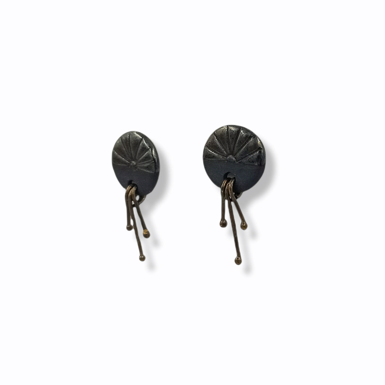 Handmade stud earrings from black porcelain with brass wires that hangs