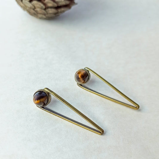 Bullet stud earrings with tiger eye cabochon.