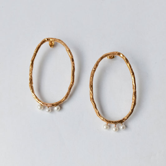 Pearl and gold earrings