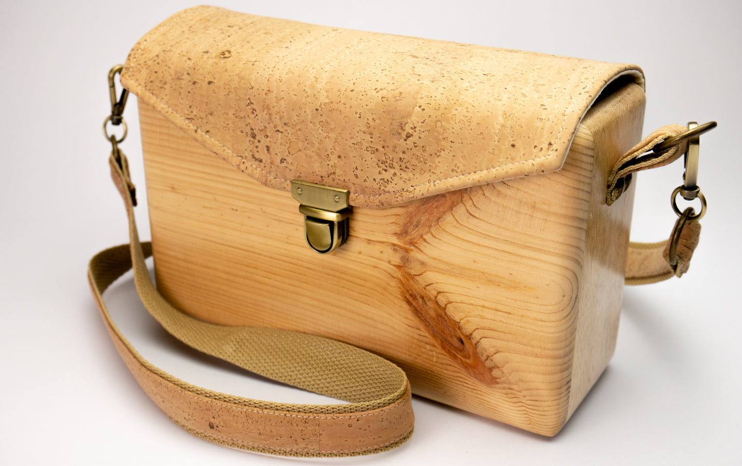 An Eco-Friendly wooden handmade crossbody bag with natural cork leather.