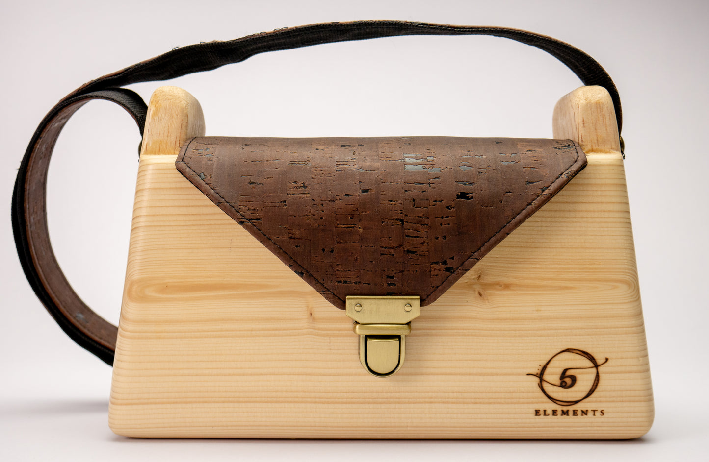 Wooden handmade shoulder bag with dark brown cork leather.