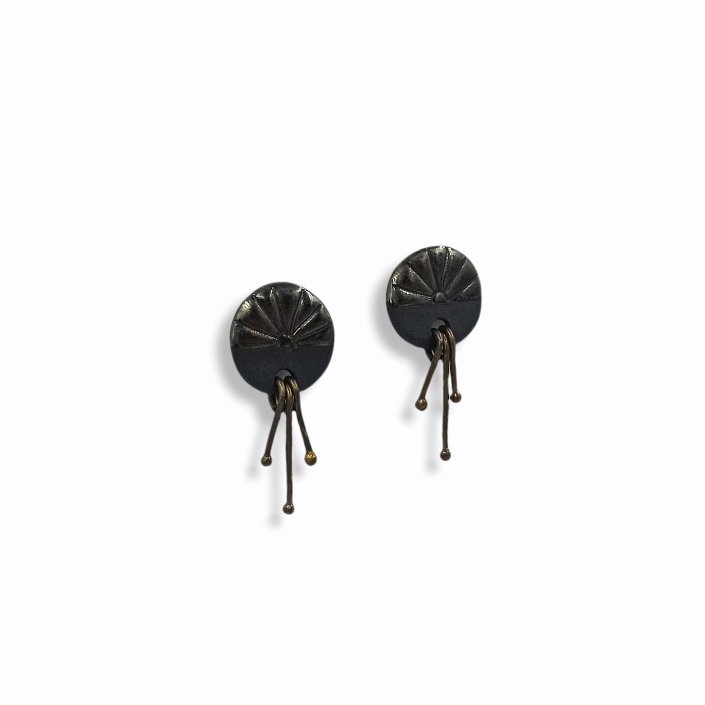 Handmade stud earrings from black porcelain with brass wires that hangs 